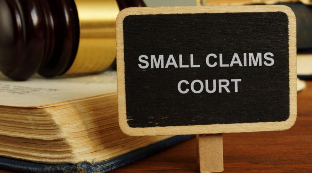 Photo of a sign reading ''Small Claims Court''